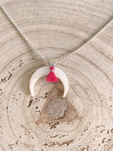 Cargar imagen en el visor de la galería, Collar plata media luna nacar de 25x5mm con cadena de bolitas de 1,2mm bañada en plata brillo de 42cm de largo y detalle de pompon en fucsia con extensión.